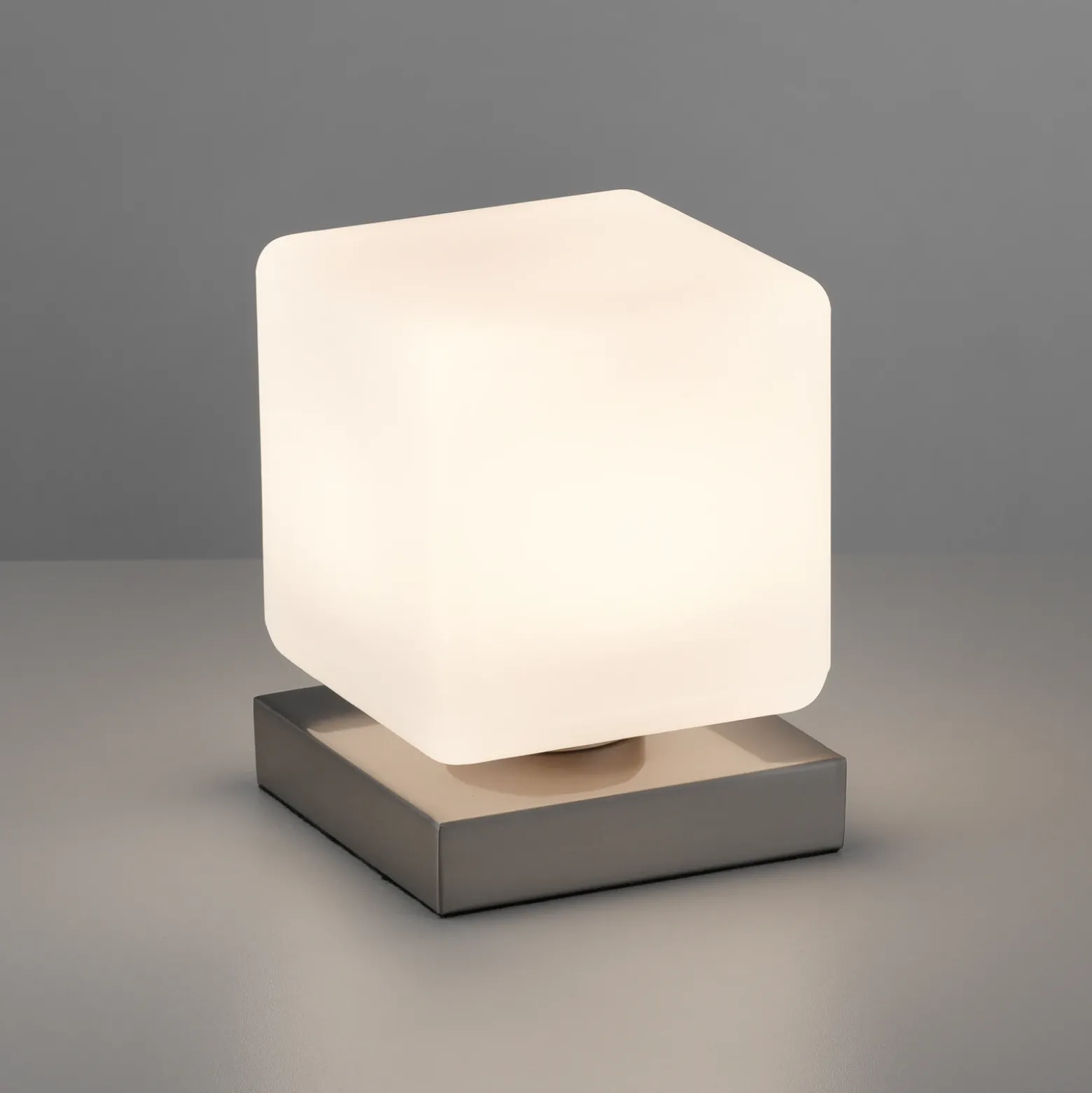 Paul Neuhaus Lámpara de mesa LED Dadoa, acero, cristal, atenuable