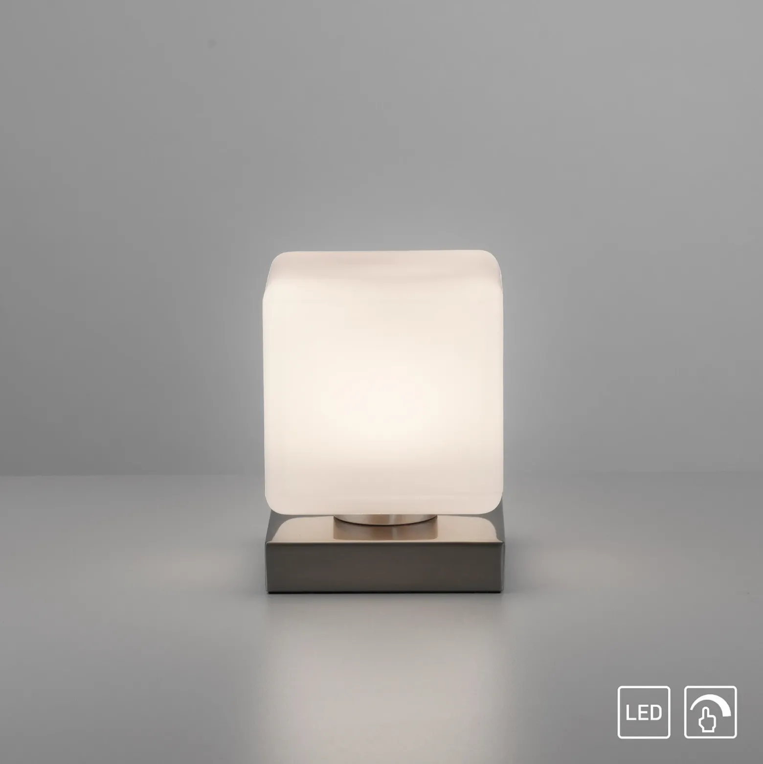 Paul Neuhaus Lámpara de mesa LED Dadoa, acero, cristal, atenuable