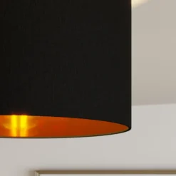Plafón Lindby Laurenz, 3 luces, negro/dorado, textil