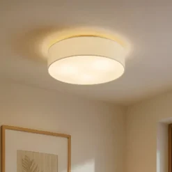 Plafón Lindby Sebatin, Ø 50 cm, blanco crema, tela, E27