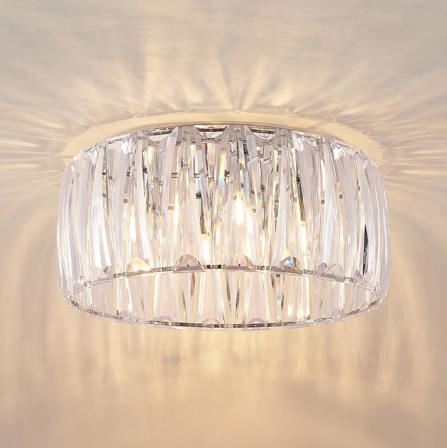 Plafón Lindby Sofia, transparente, acrílico, Ø 46cm