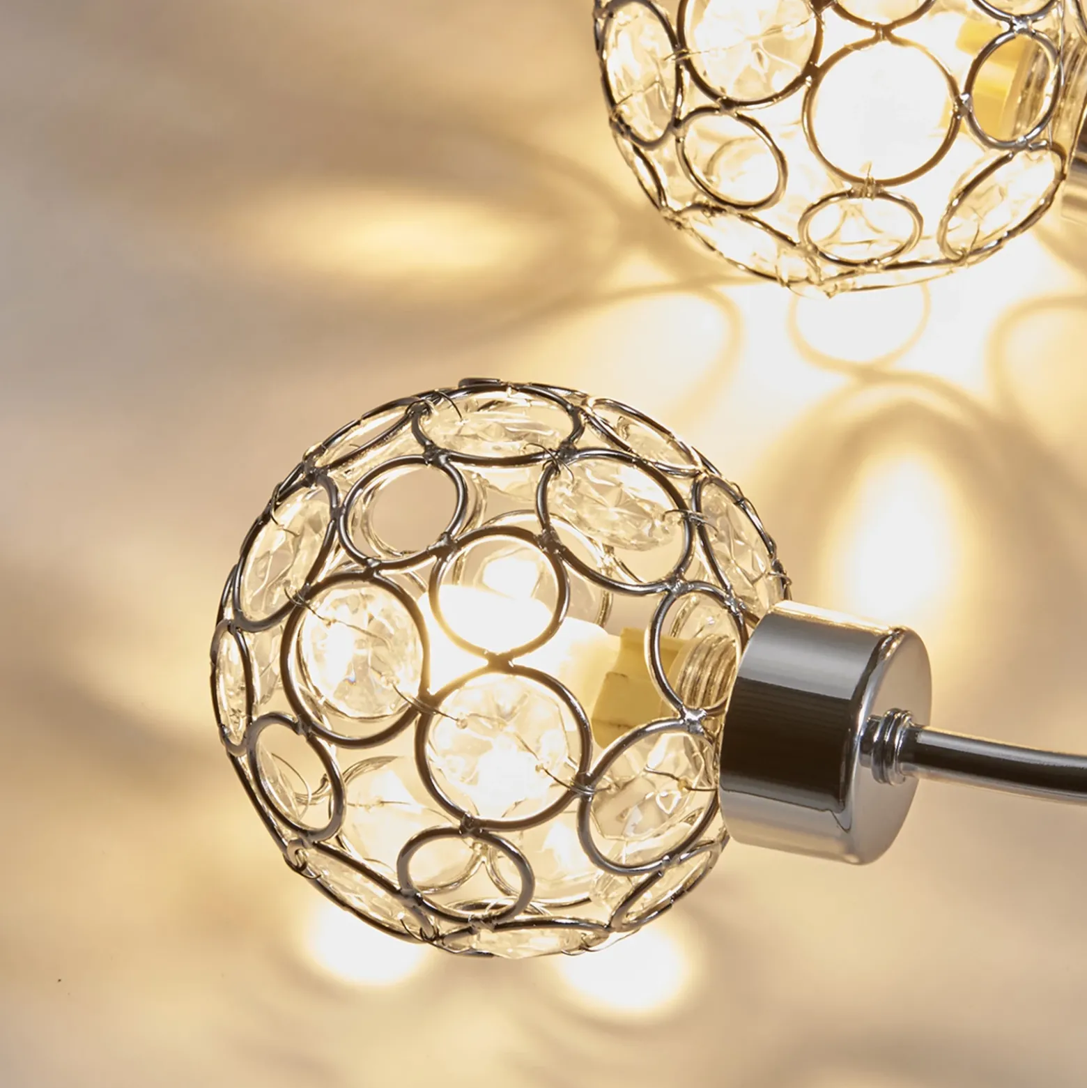 Plafón Lindby Tyron, Ø 65 cm, cromo, cristal, metal