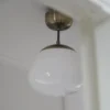 Plafón Rise, latón envejecido, cristal, Ø 25 cm
