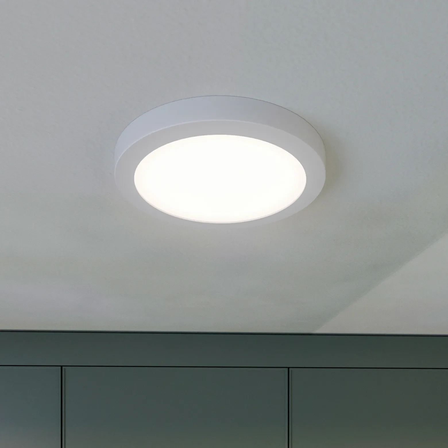 Prios lámpara LED de techo Aureka, detector de movimiento, Ø 23 cm, blanco