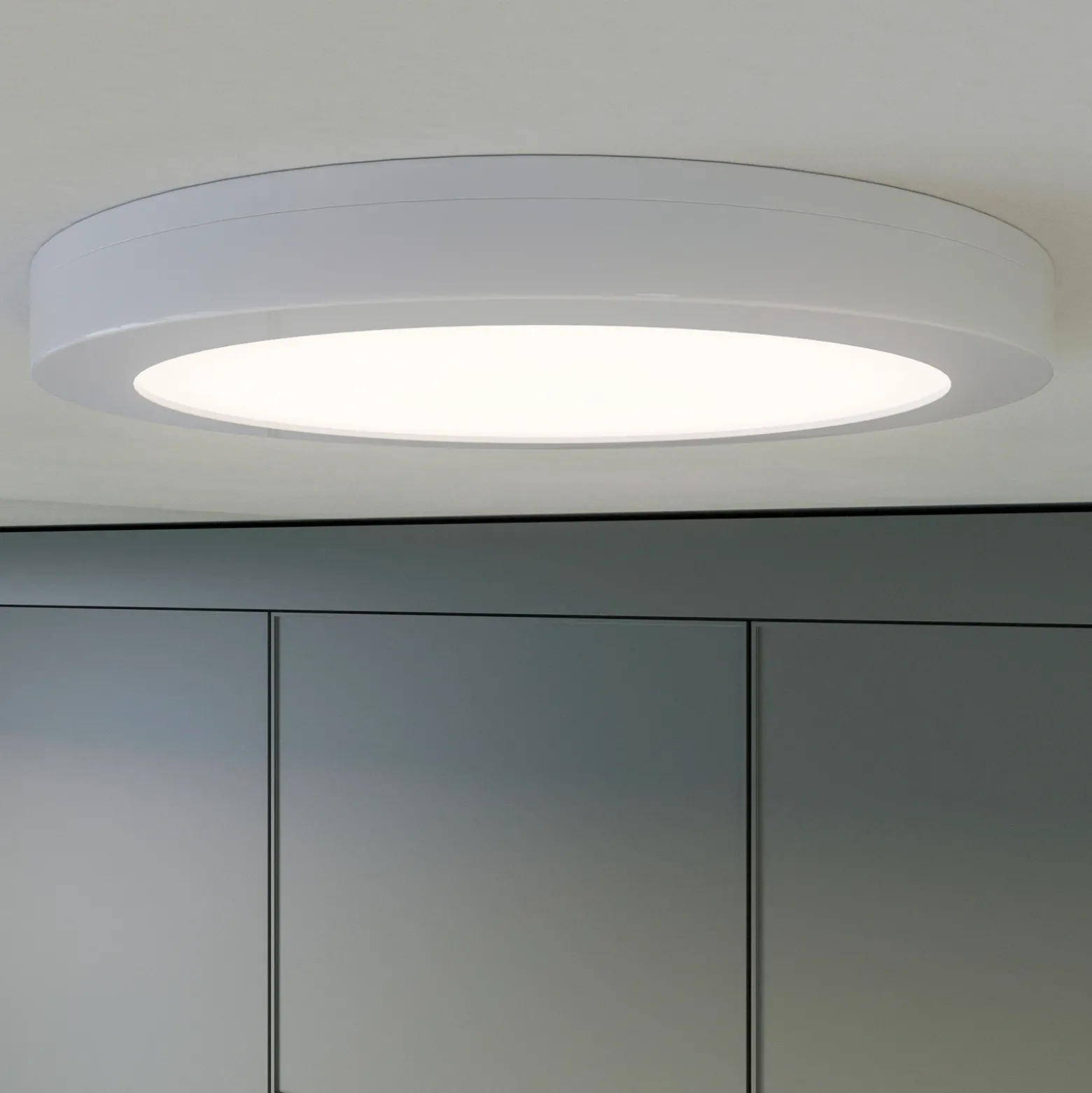 Prios lámpara LED de techo Aureka, detector de movimiento, Ø 23 cm, blanco