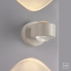 Schöner Wohnen aplique de pared LED Chia, arena 3000 K arriba/abajo